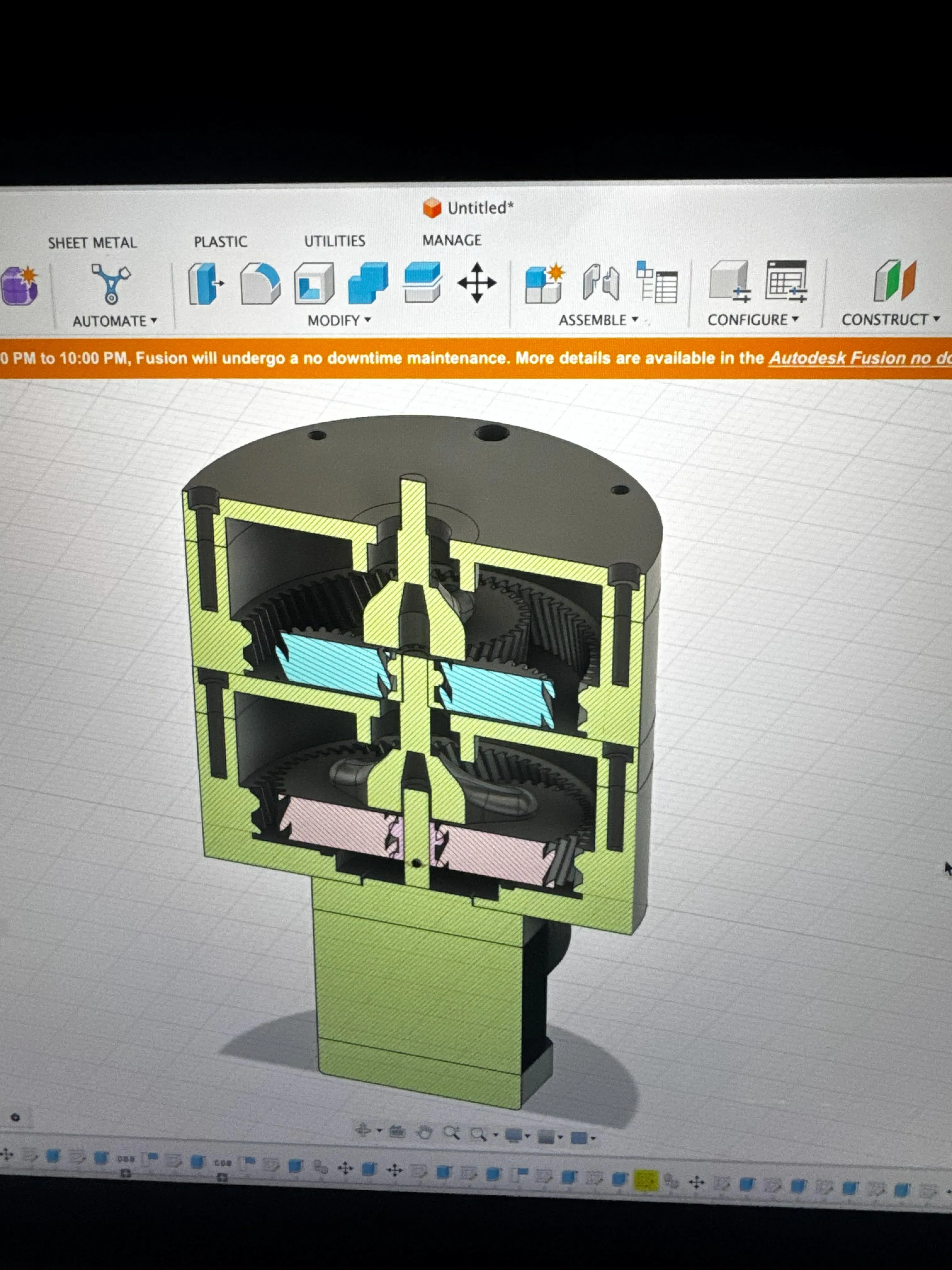 A Fusion 360 cutaway of the mount's planetary gearbox, showing the stacked helical gear stages inside the printed housing above a stepper motor.